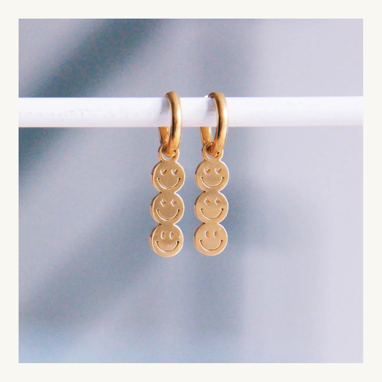 Smiley gold earrings
