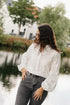 Witte blouse dames – luchtige zomerse blouse met lange pofmouwen en bloemendetails bij My Dressing