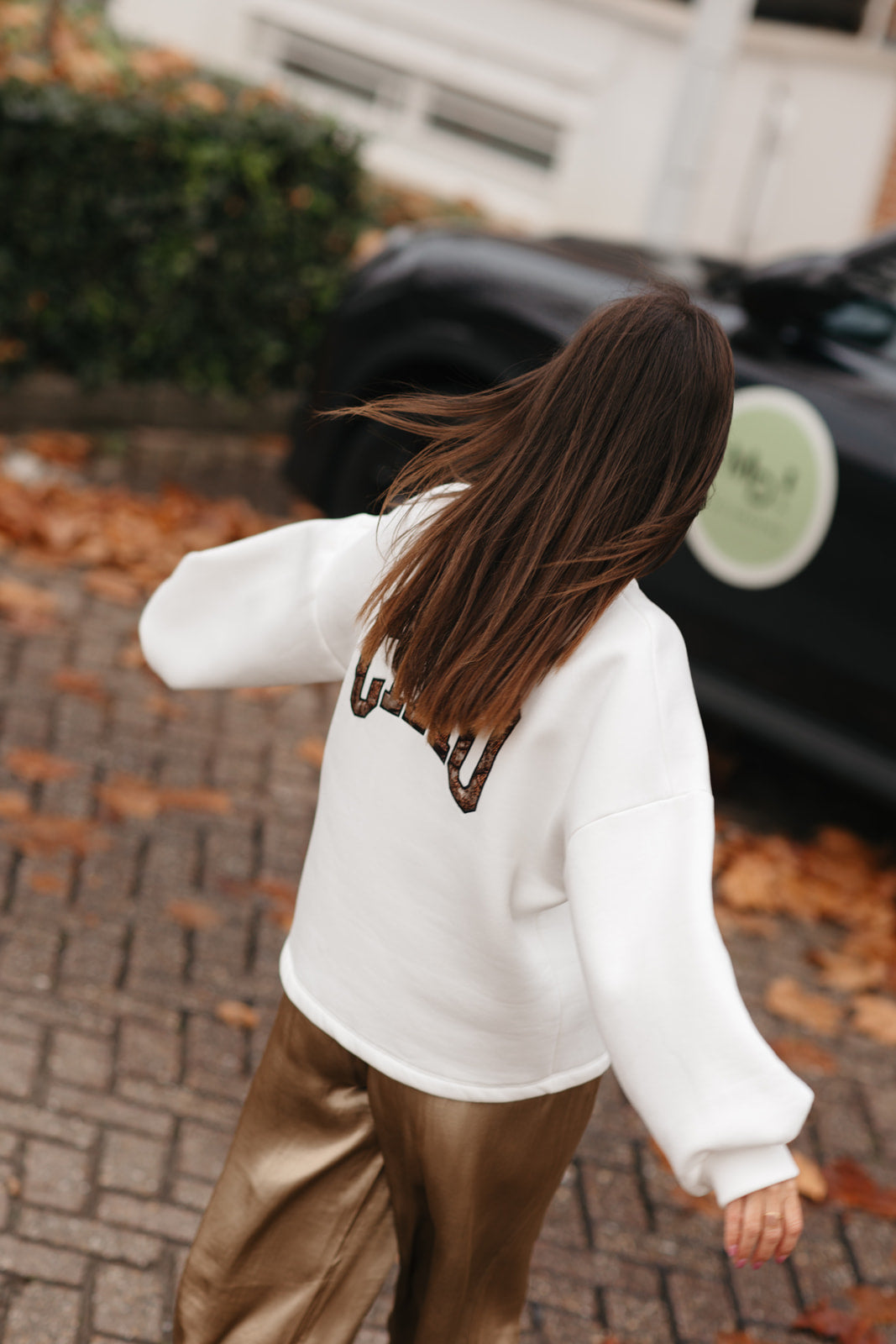 Witte fleece sweater met Ciao opgedrukt