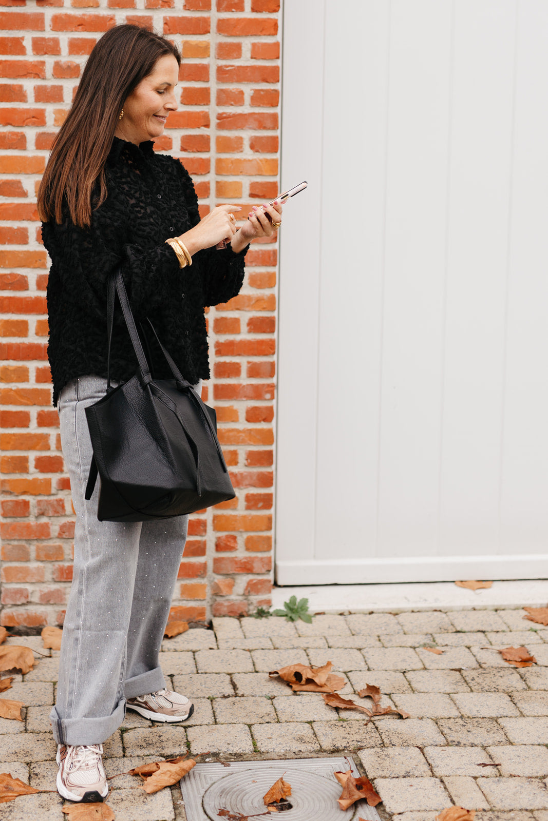 Zwarte blouse met pofmouwen en knoopsluiting