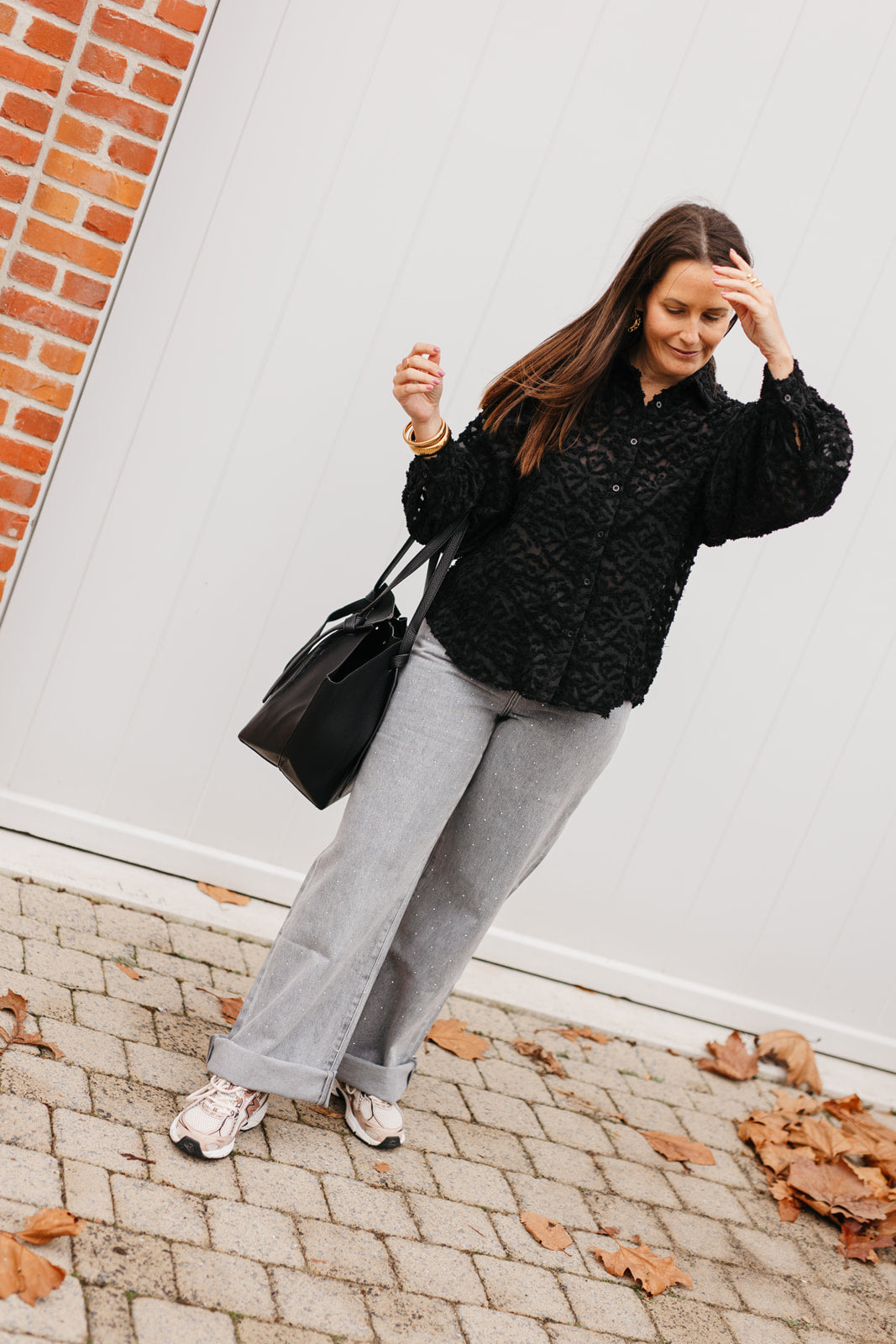 Zwarte blouse met pofmouwen en knoopsluiting