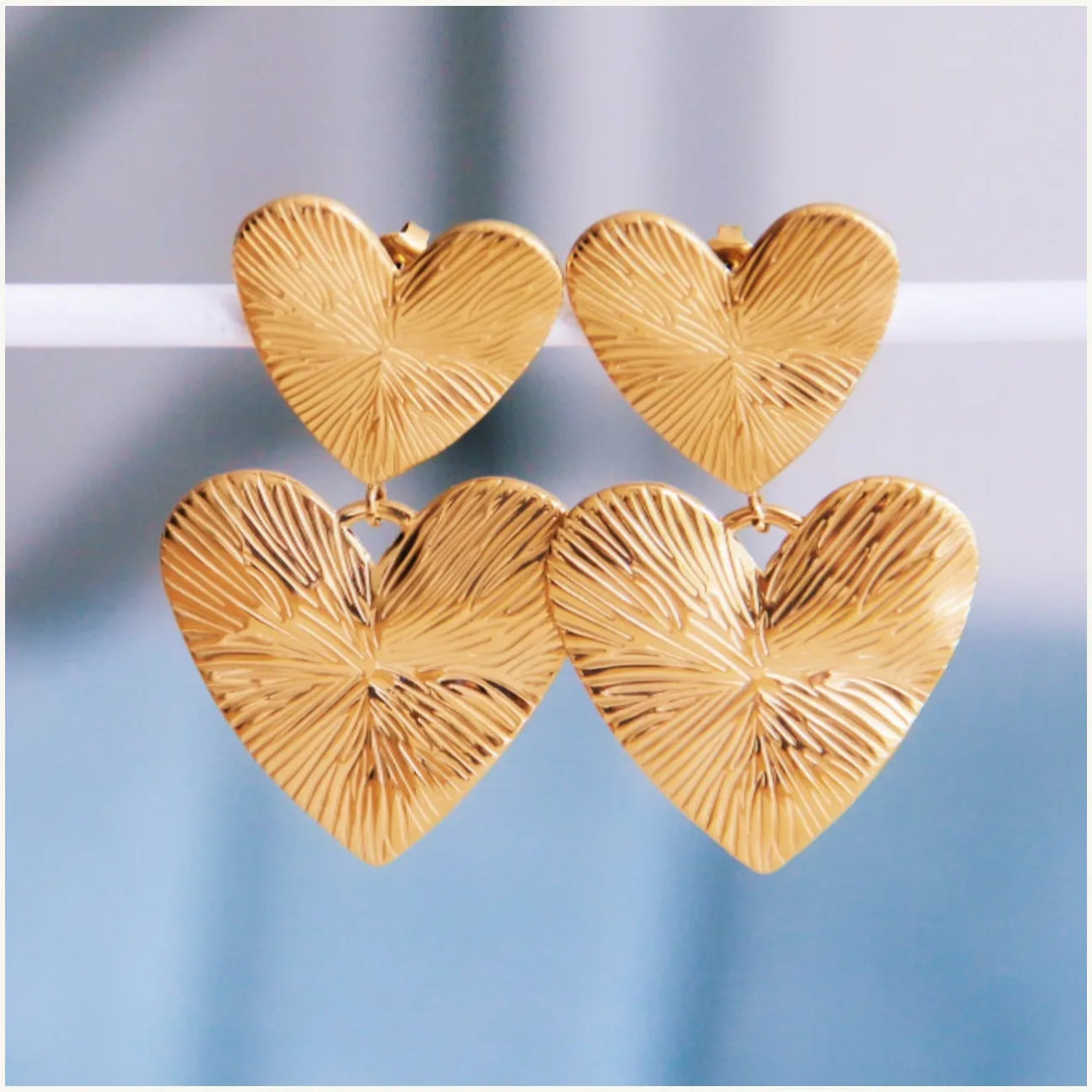 2 hearts statement earrings Bazou