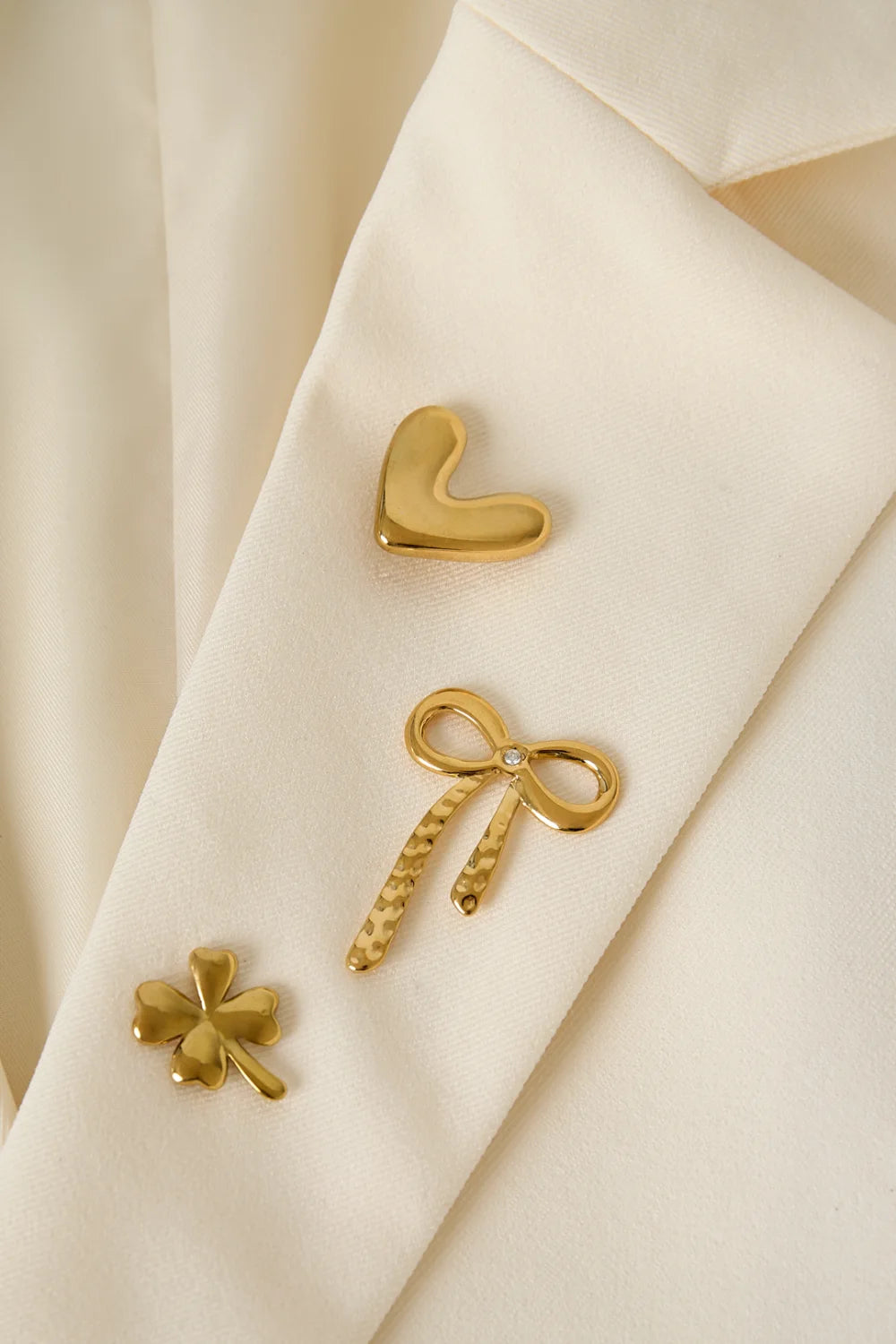 Broche set Happy