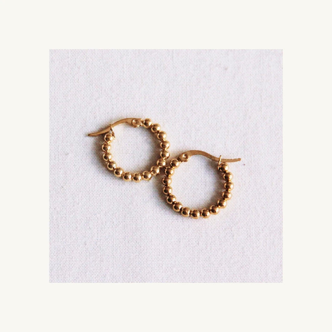 Golden hoops earrings