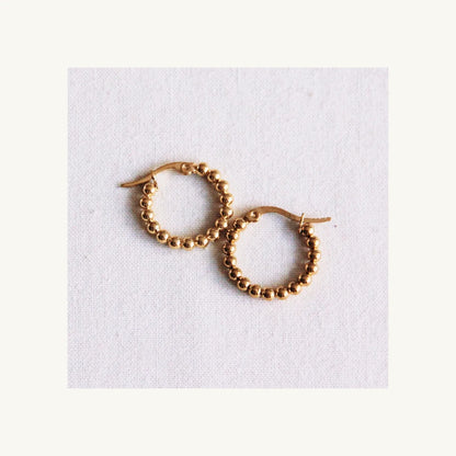 Golden hoops earrings