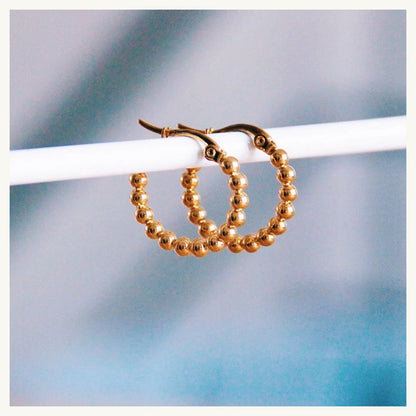 Golden hoops earrings