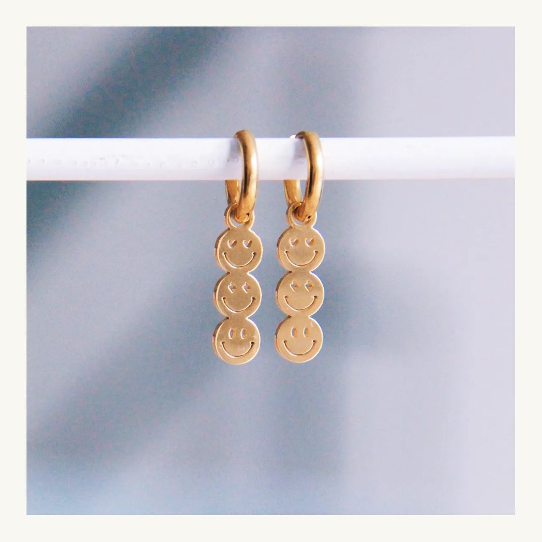 Smiley gold earrings