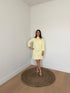 pastelgele korte jurk met lange mouwen - My Dressing