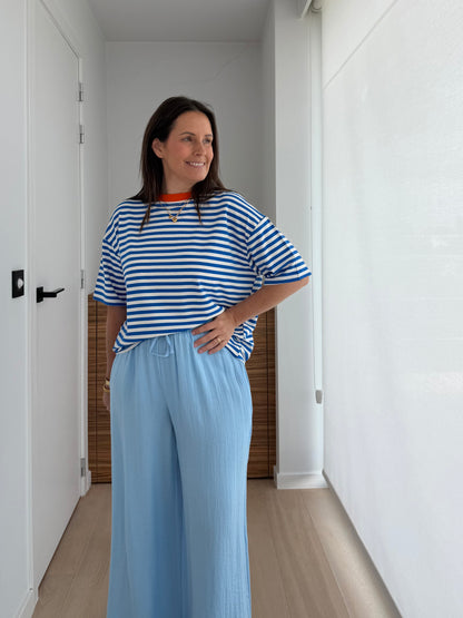 Oversized blauw-witte gestreepte dames T-shirt met oranje halsdetail