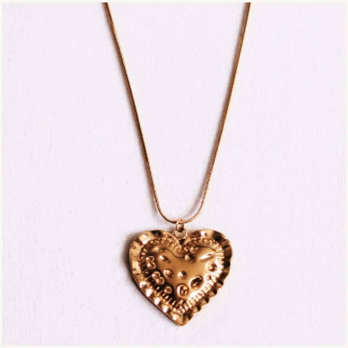 Snake ketting met bewerkt hart halsketting