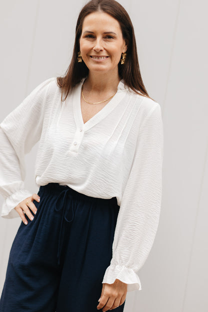 Dames blouse beige – zachte blouse met V-hals, elastische mouwen en pofeffect aan de polsen
