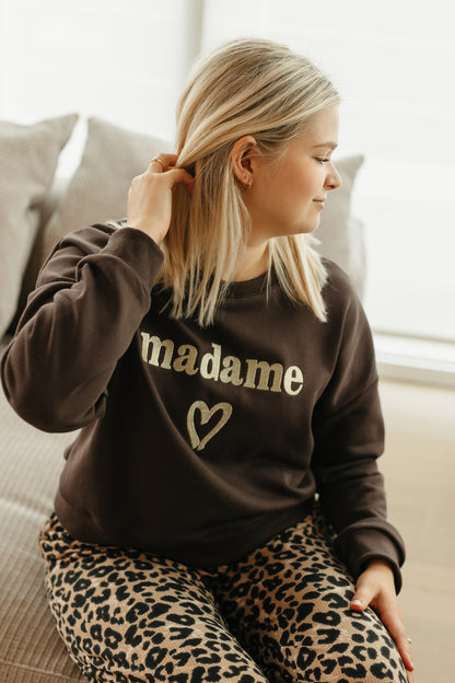 Dames trui bruin – comfortabele sweater met gouden MADAME tekst, chic en casual