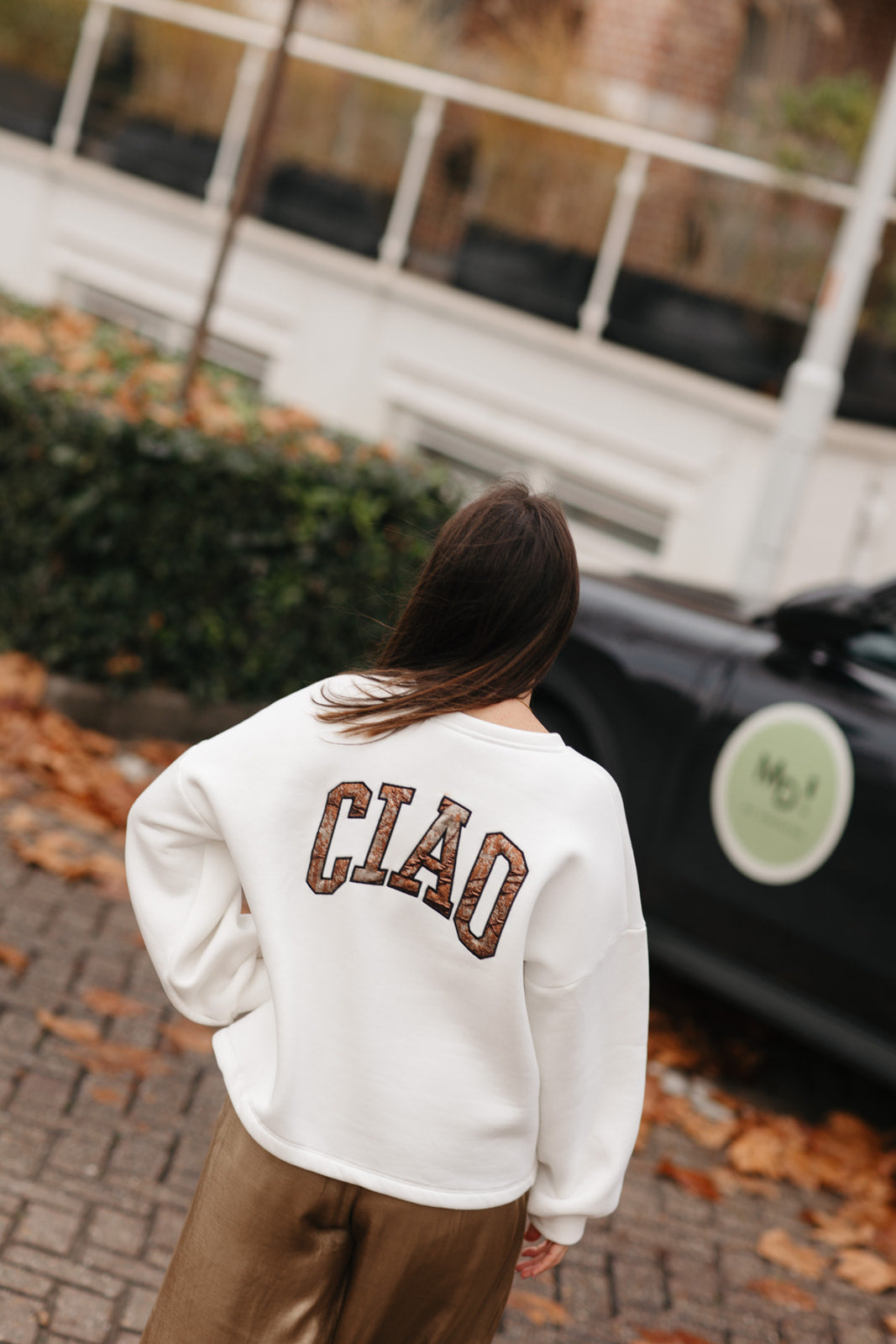 Witte fleece sweater met Ciao opgedrukt