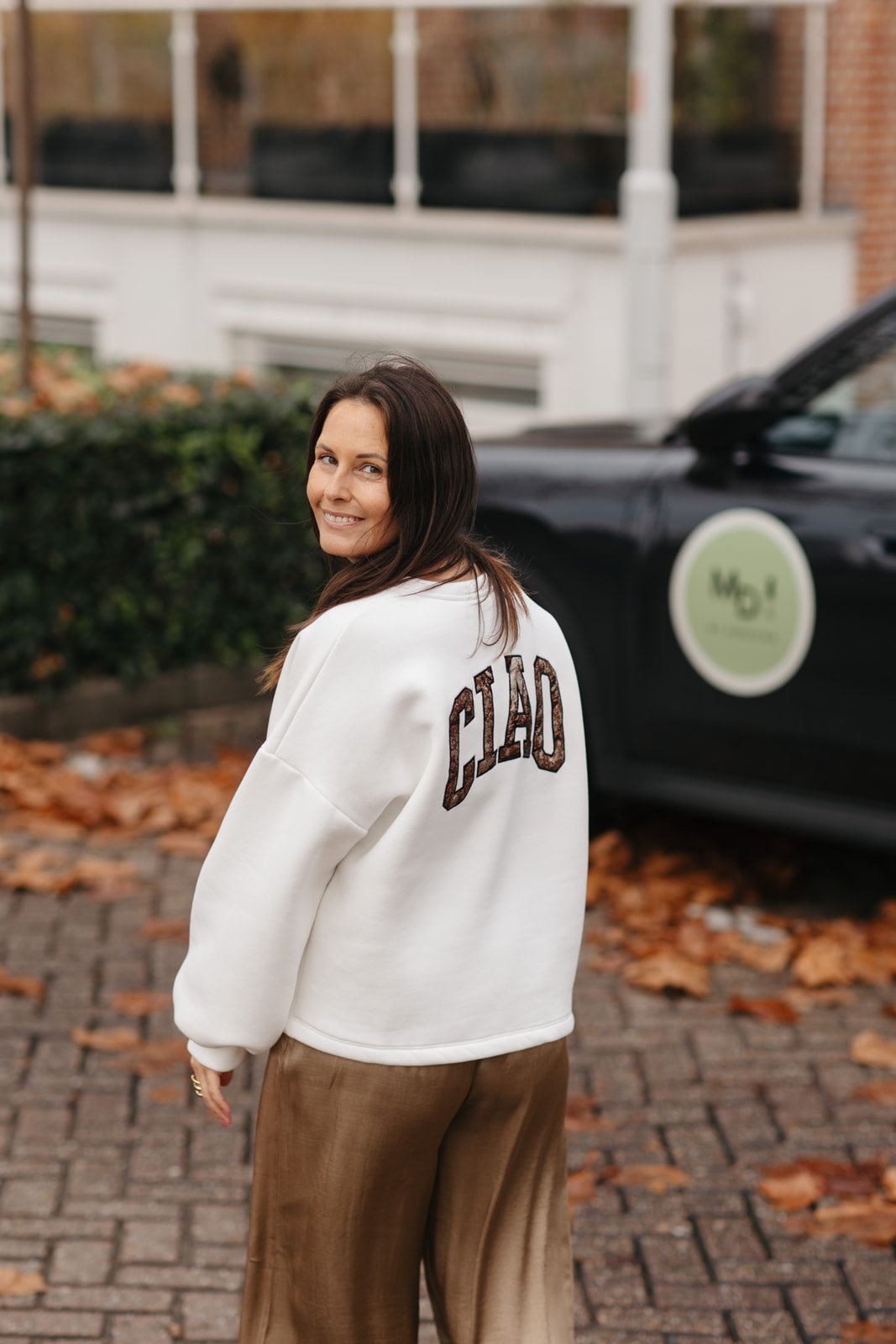 Witte fleece sweater met Ciao opgedrukt