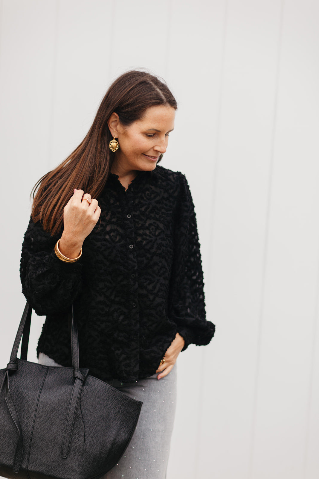 Zwarte blouse met pofmouwen en knoopsluiting