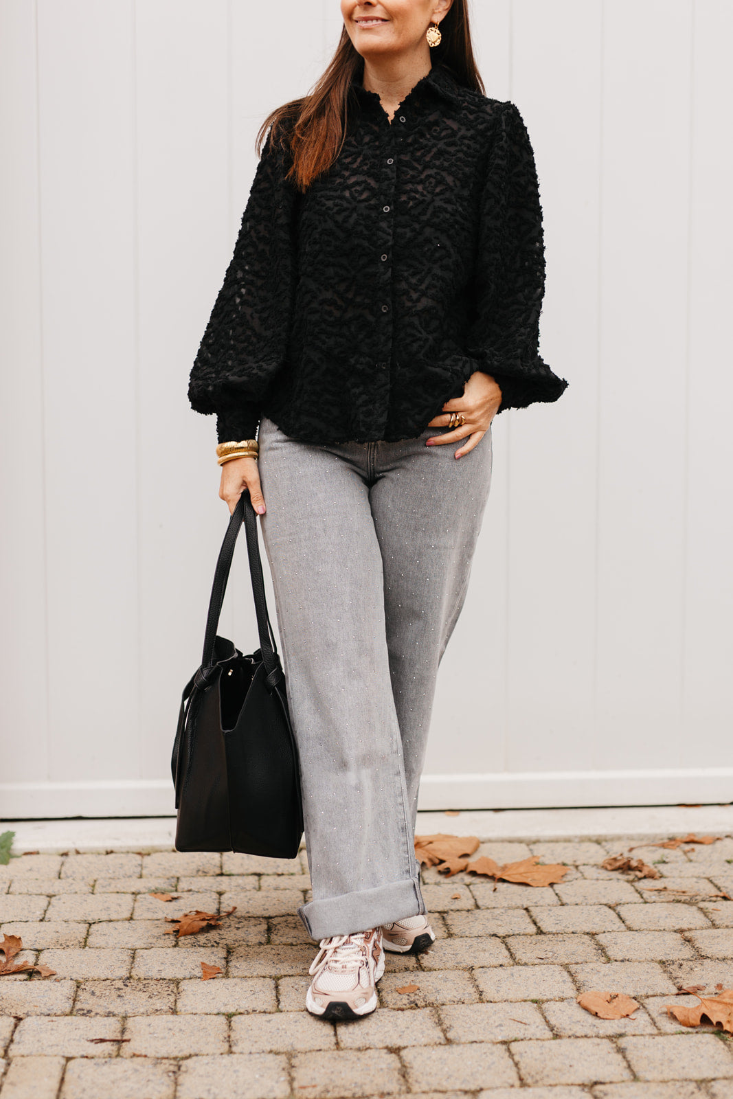 Zwarte blouse met pofmouwen en knoopsluiting