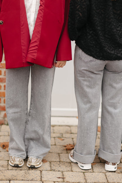 Achteraanzicht van jeans met zakken en sparkle